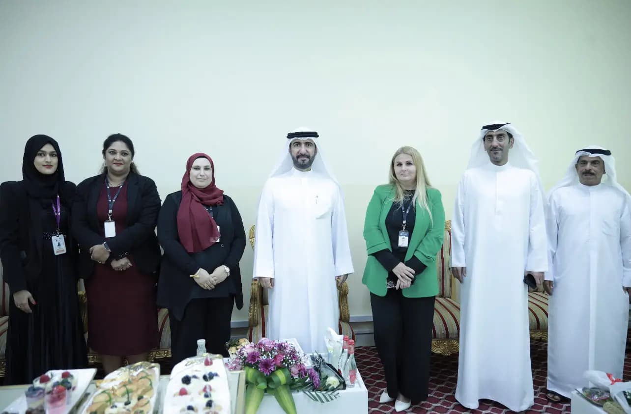 School staff and guests at a celebration