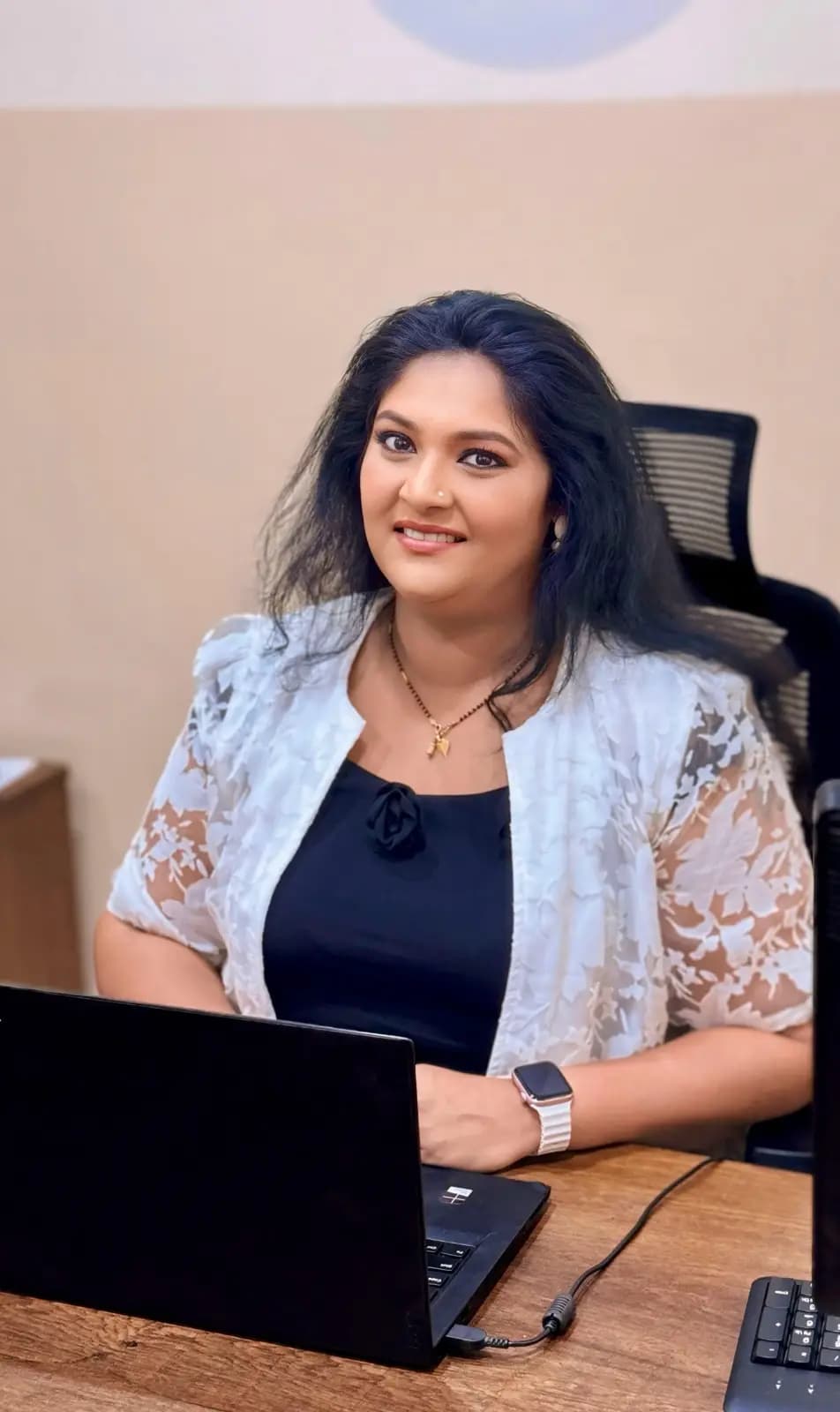 Ms. Resmi Nishand Nair, Head of Admin and Operations at Woodlem British School